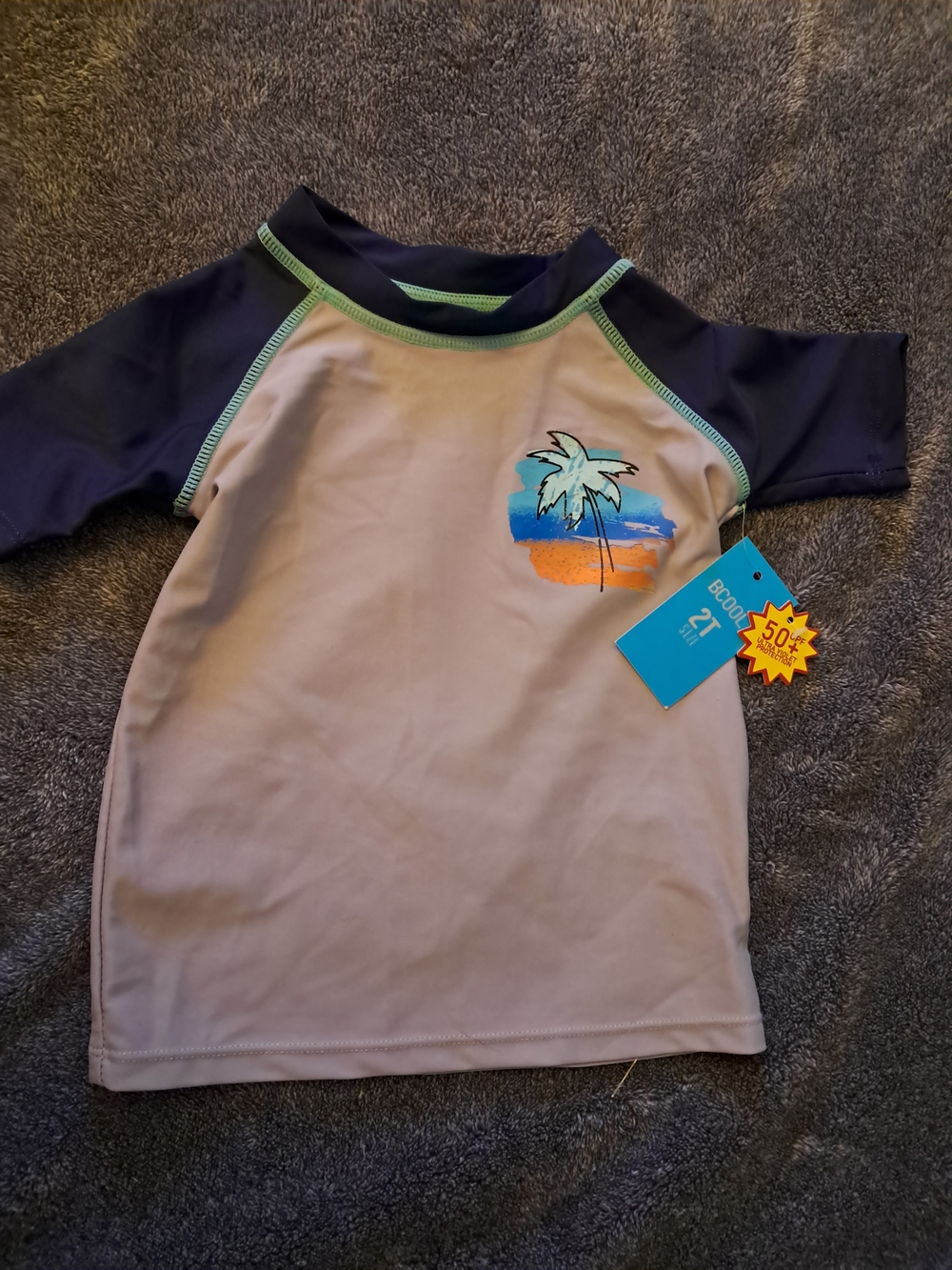 Toddler Short-Sleeve Swim Rashguard in Beige and Navy with Palm Graphic